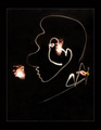 Illusion - An artist posts for himself for flashlight caricature