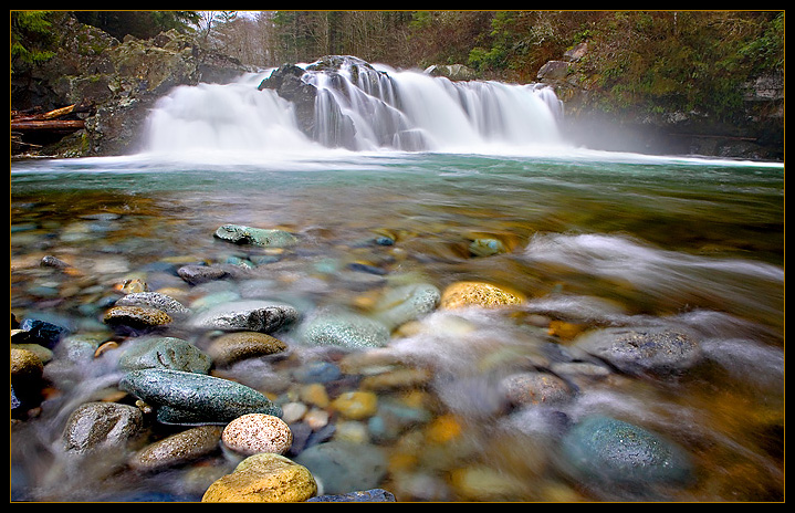Nature's song is heard in a rushing river