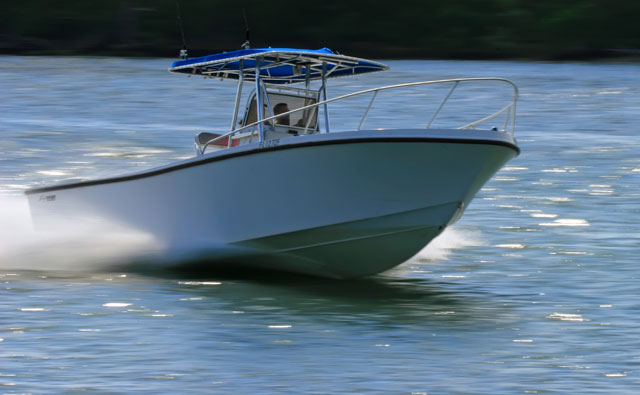 Panning on the water.....a boat is racing by