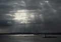 Breaking Clouds Over New York Harbor