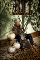 Old woman with pumpkins