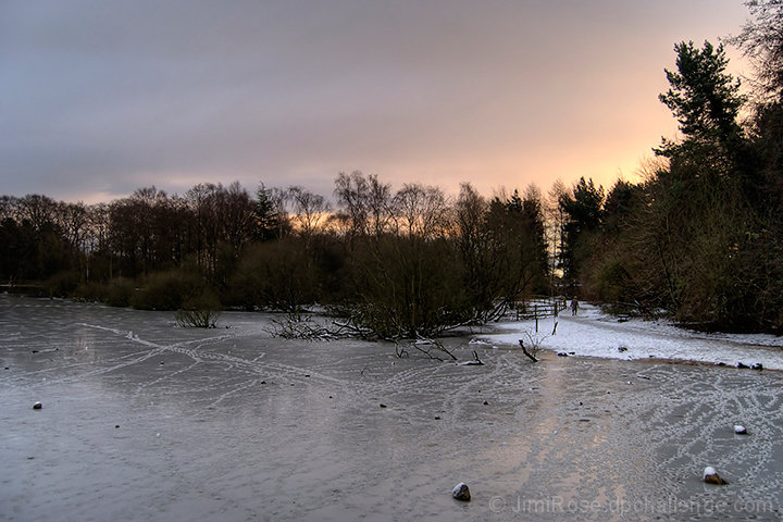 A Lonely Wanderer by the Frozen Lake