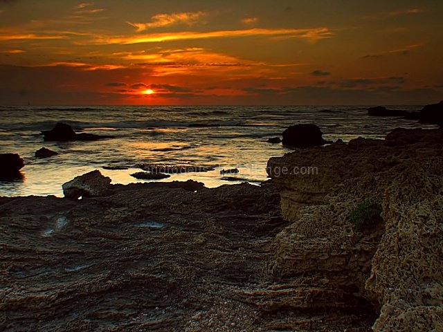 Sunset on a Rocky Shore