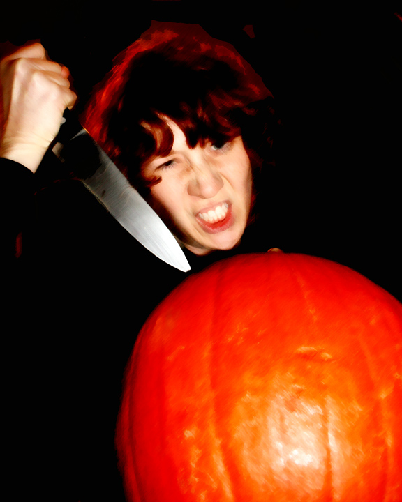 Wife carving pumpkins while in a fit of rage