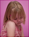 Backlit, Centered, Portrait of a Pink Girl Feeling Blue.