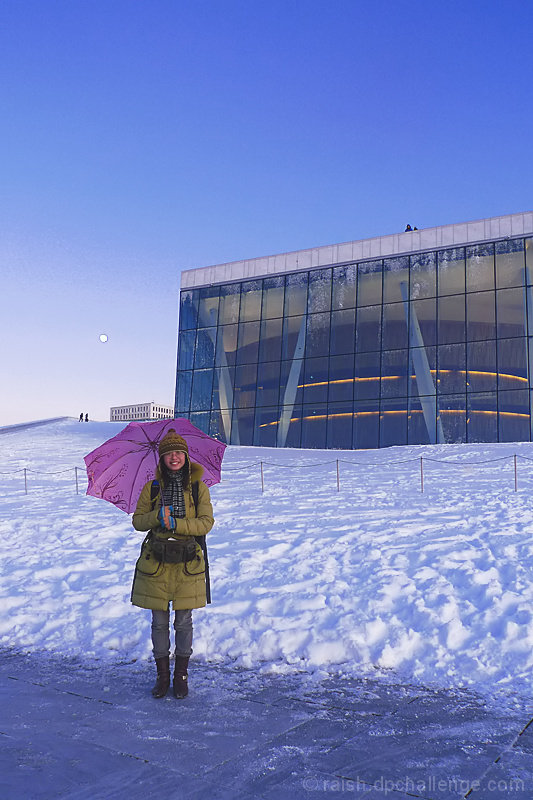 At the Opera in Winter, the Moon Comes Up as the Sun Goes Down.