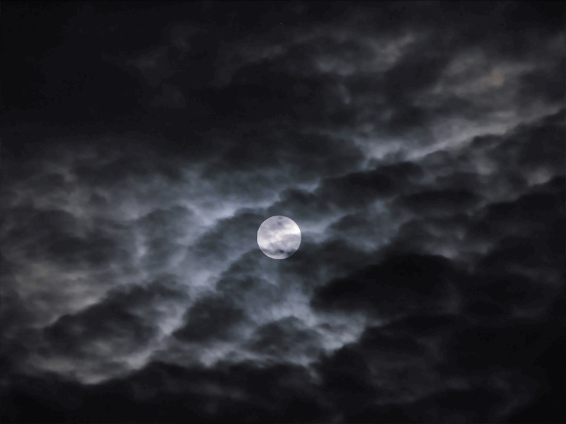 The Moon was a ghostly galleon, tossed upon cloudy seas