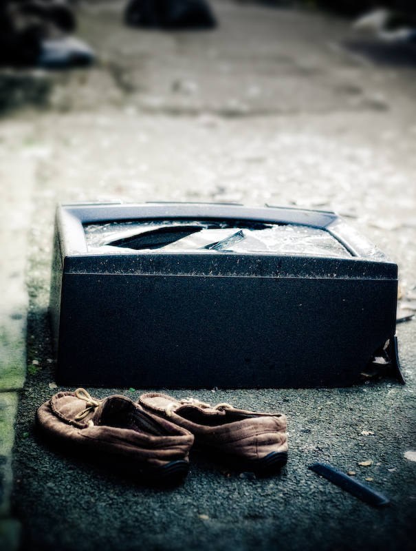 Morning Frost On Broken Television With Slippers And Comb