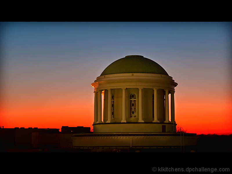 sun setting on the dome