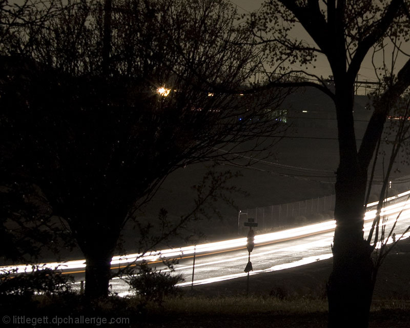 57th Ln. glows with activity even when it rains