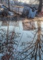 Leaning Shed on Steaming Winter Pond