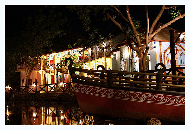 Pirate Ship near a lake side Church