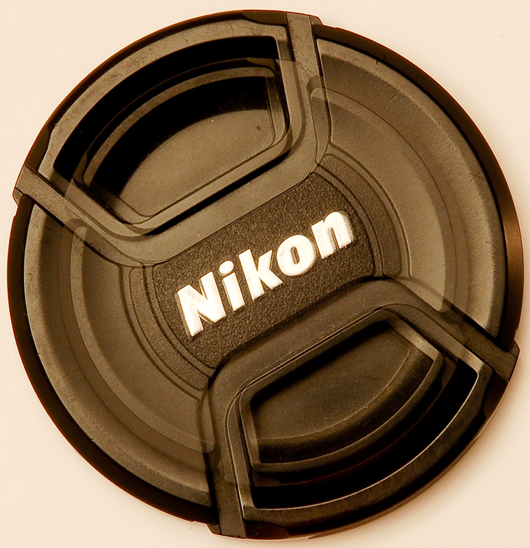 67mm vs 52mm lens cap