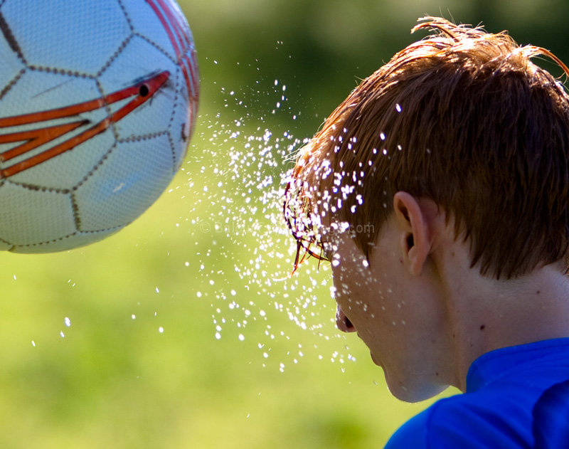 Wet Soccer Game Action 