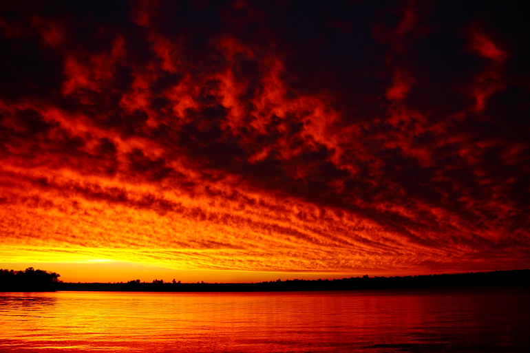 Stormy sunset over the lake