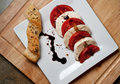 Caprese salad with strawberry balsamic reduction