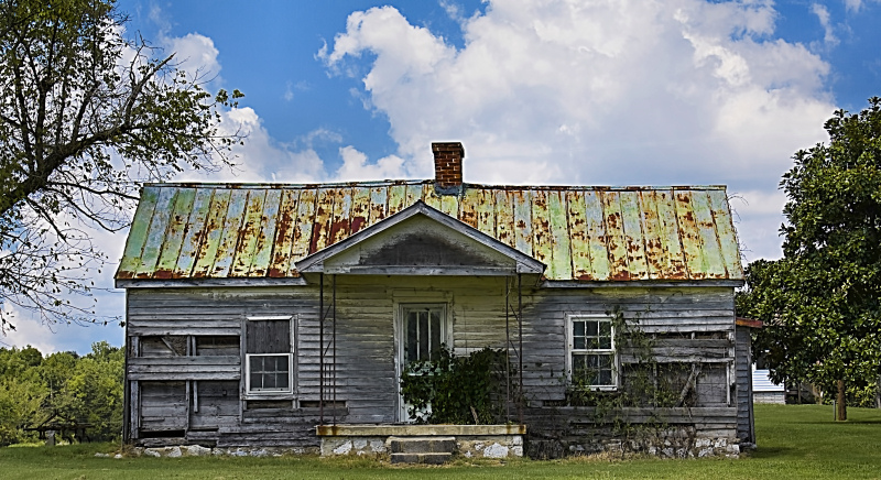 Rusted Tin Roof on a Dilapidated House