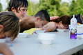 Ice cream eating contest is a 'beat the heat' treat for local kids.