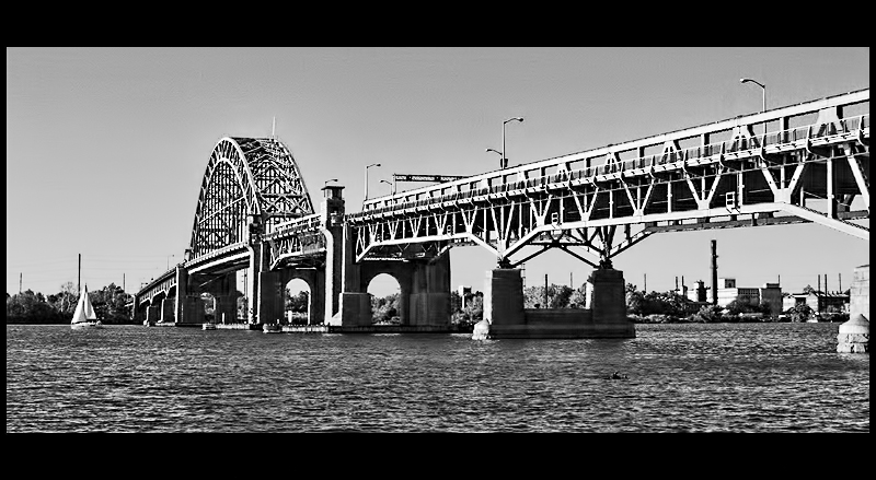 Combination steel arch, double-leaf bascule bridge