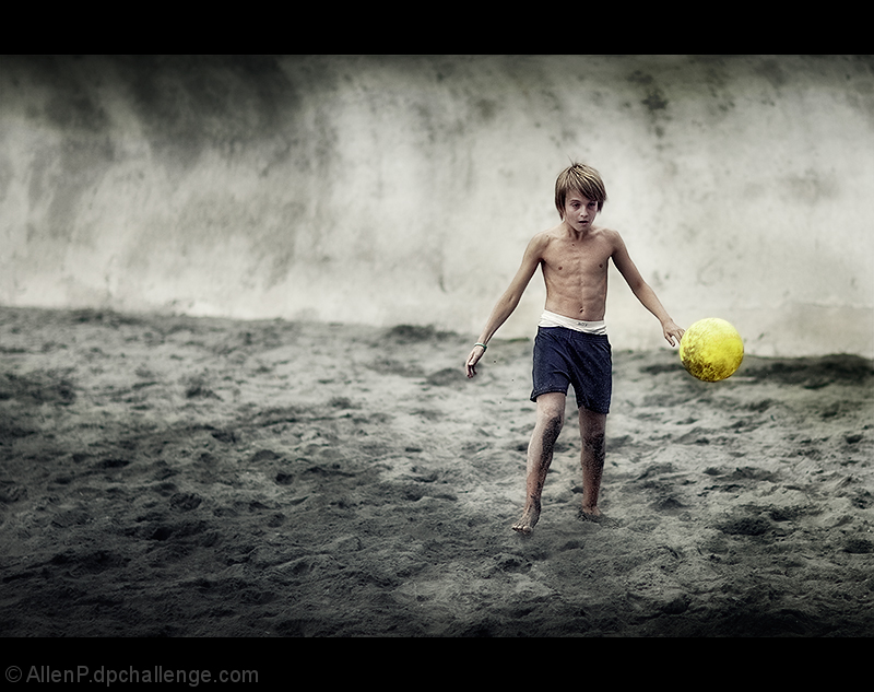 Boy with a good "head" on his shoulders likes to play with a "ball"