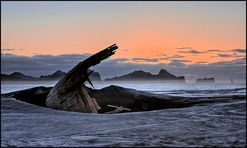 Old wreck in frozen sand