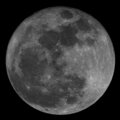 Large Round Thing Against A Black Background