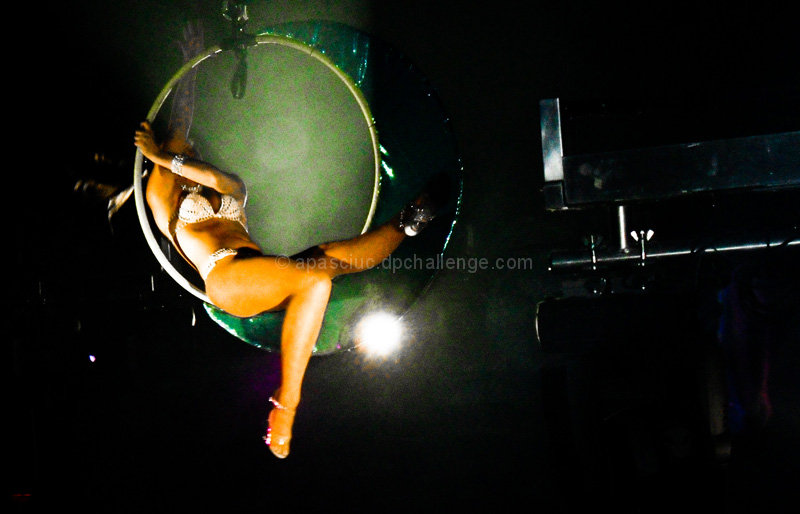 Aerial Goddess Performing Above the Nightclub