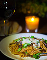 Linguine with tomatoes, mushrooms, basil and Parmigiano Reggiano.