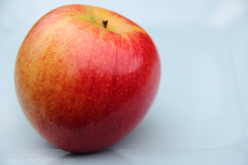 Shiny Apple on a Turquoise Platter