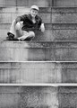 Seated on Speckled Steps