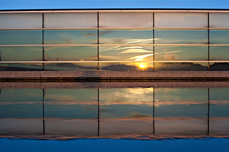 Sunrise in window and water