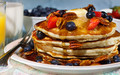 Buttermilk Pancakes With Fresh Berries And Glazed Pecans