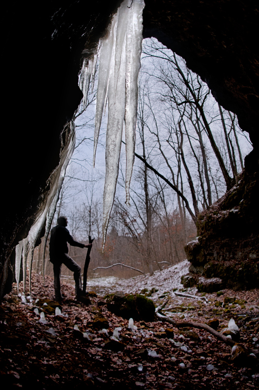 Under the icicles.