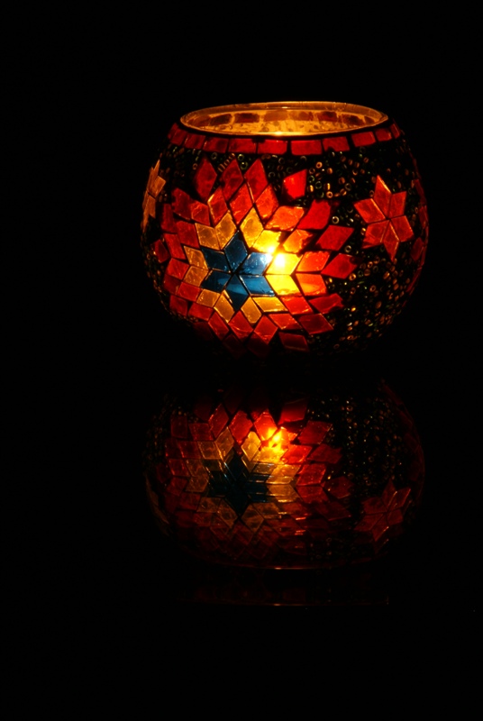 and the darkness can never extinguish it