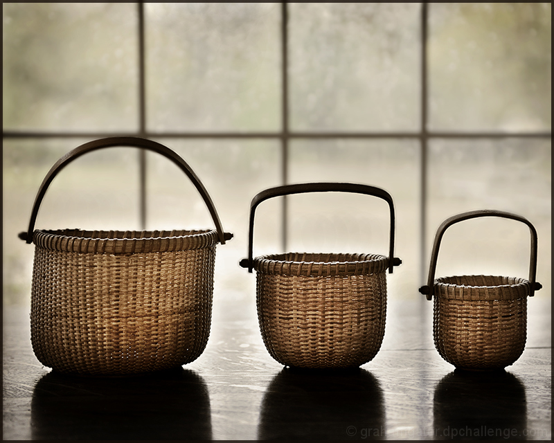 baskets, shadows, window panes