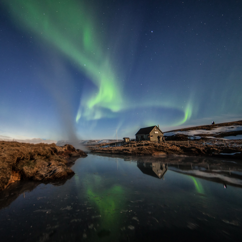 Lights dancing above the house