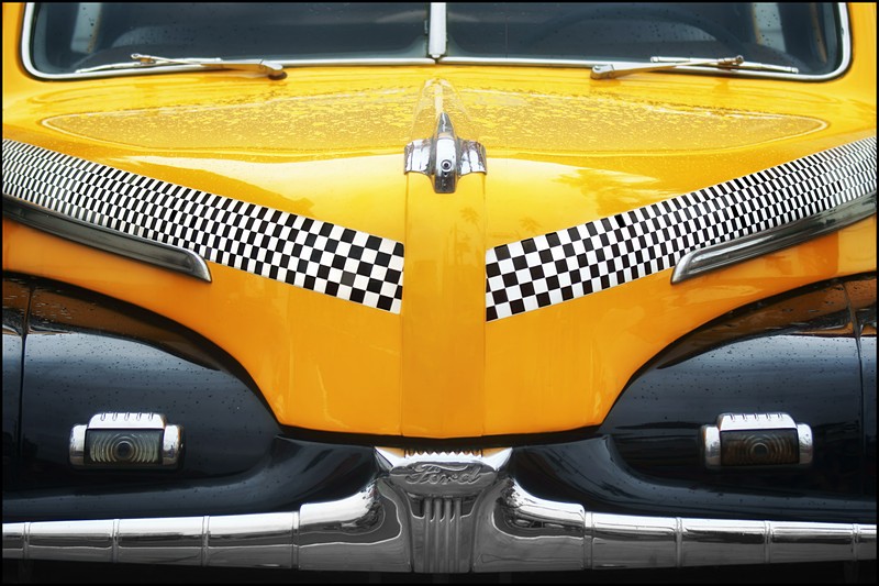 Checkered Cab in the Rain