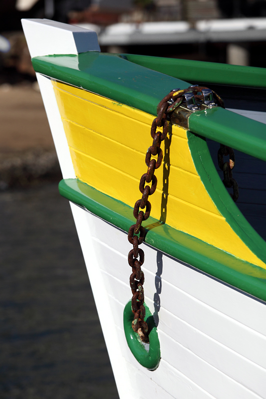 Weigh the anchor chains I wear crisscrossed upon my heart