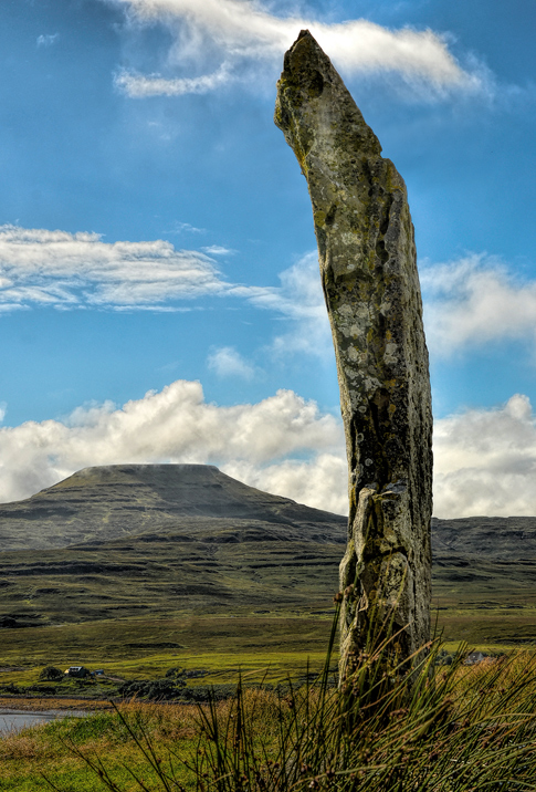 ...tall, gaunt finger pointing to the sky, who raised you here, and why?