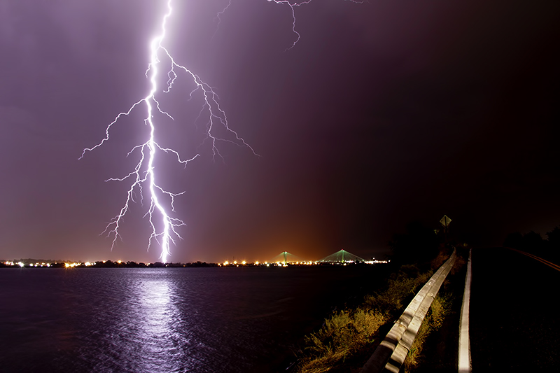 Sky touches Earth with Fire over Water