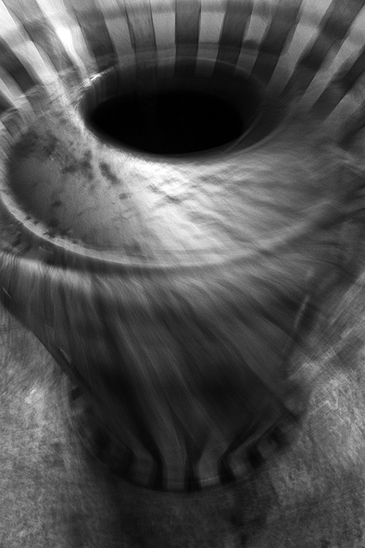 blurred  - centered - leading lines into the black hole