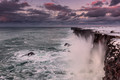 Two men on the edge of the rock