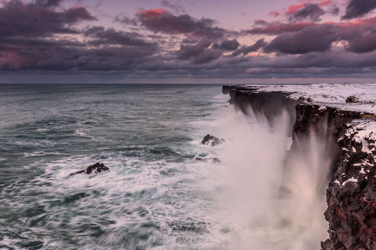 Two men on the edge of the rock