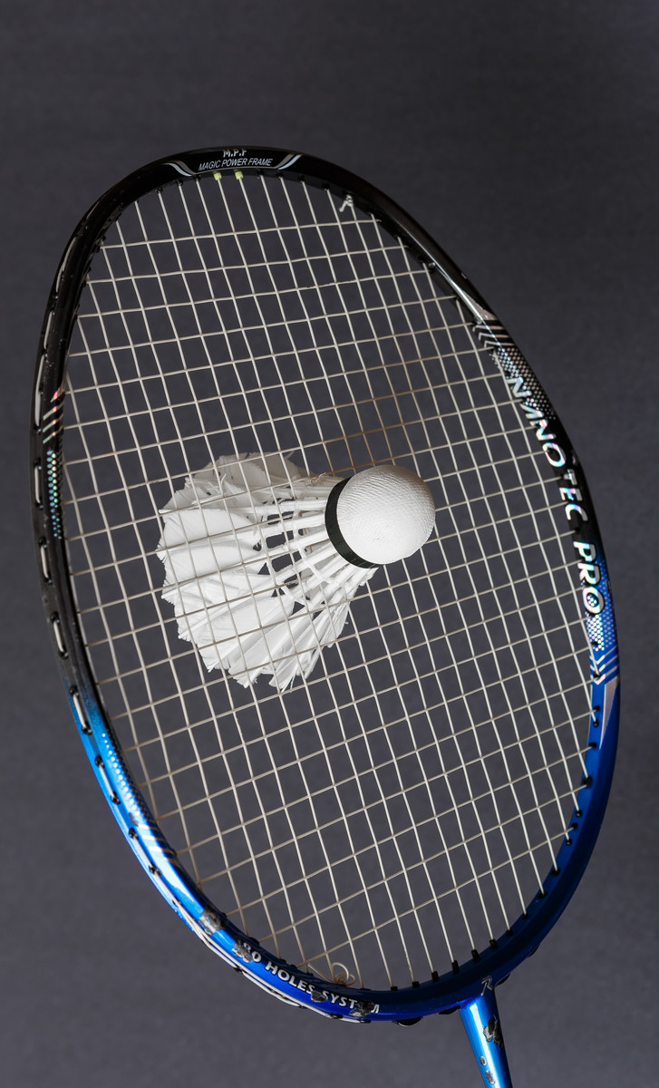 Shuttlecock Stuck in Racquet