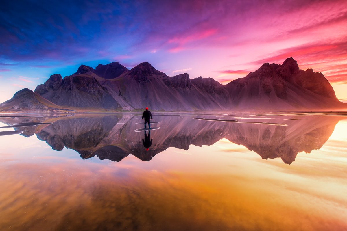 A man looking at the mountain