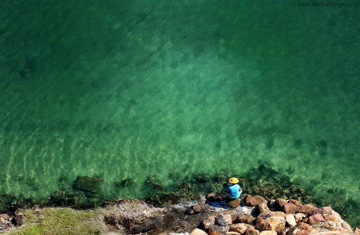 The fisherman with a yellow hat
