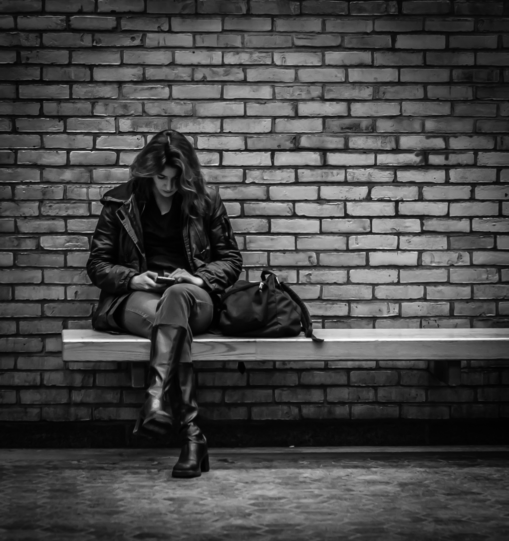 Woman Texting Waiting Subway Train