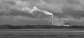 Power Station Smoke Stack Erupts in the Clouds