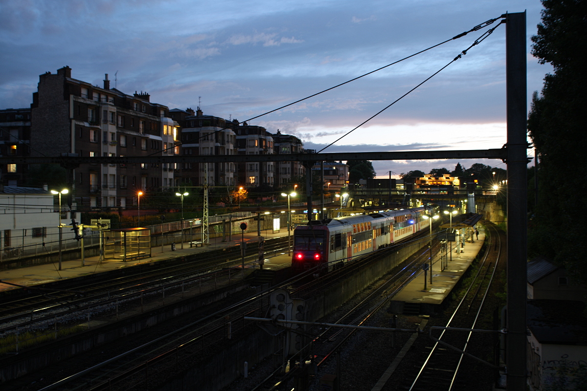 Suburban railway station at dusk
