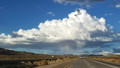 cloudburst with rainbow